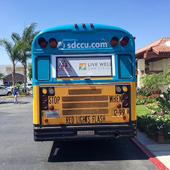 SDCCU, iHeartMedia, SDCOE Stuff the Bus Program