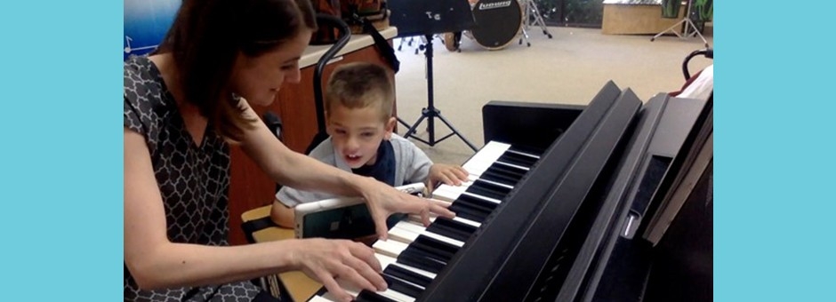 woman teaching child piano