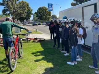Youth learning about bikes