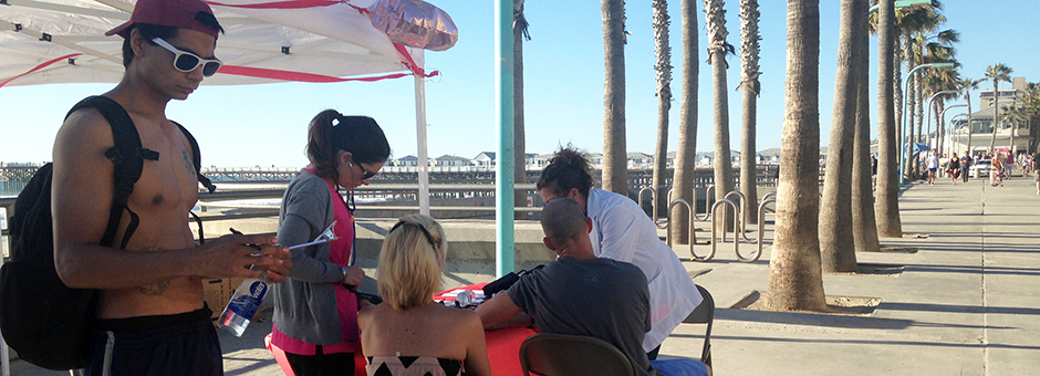 Enjoying Sand, Surf, and Sun While Loving their Hearts at the Pacific Beach Lifeguard Station
