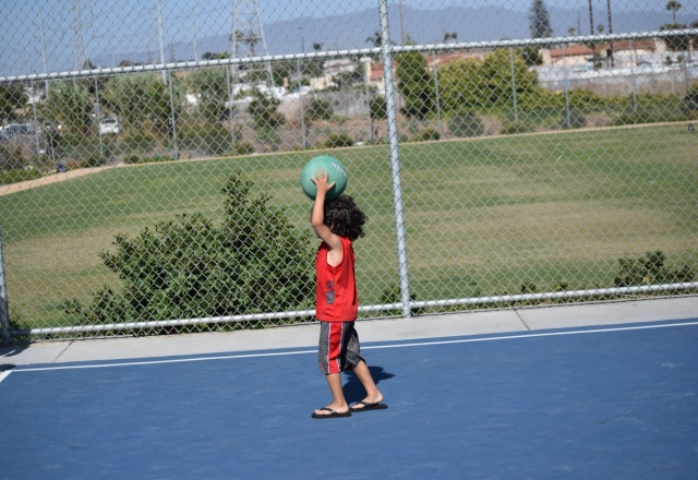 Empower Hour Kid Playing with Ball